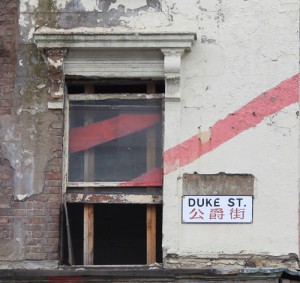 Derelict building with Duke Street Sign
